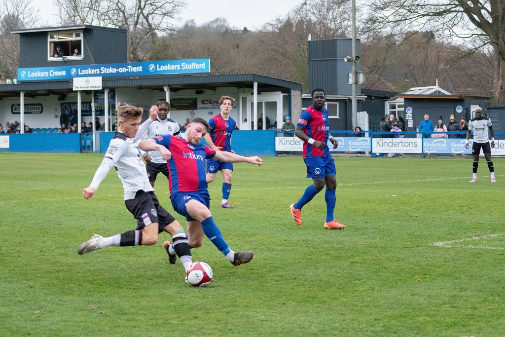 A tackle during a football match